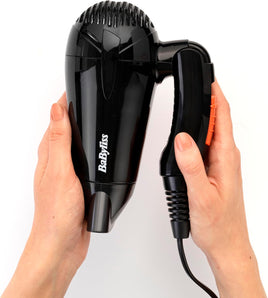 Uscător de păr BaByliss Travel Folding – Ușor și puternic, 2000W, tensiune universală, utilizabil oriunde în lume, 2 trepte de temperatură/viteză, Negru/Portocaliu, 5334E. Perfect pentru călătorii.